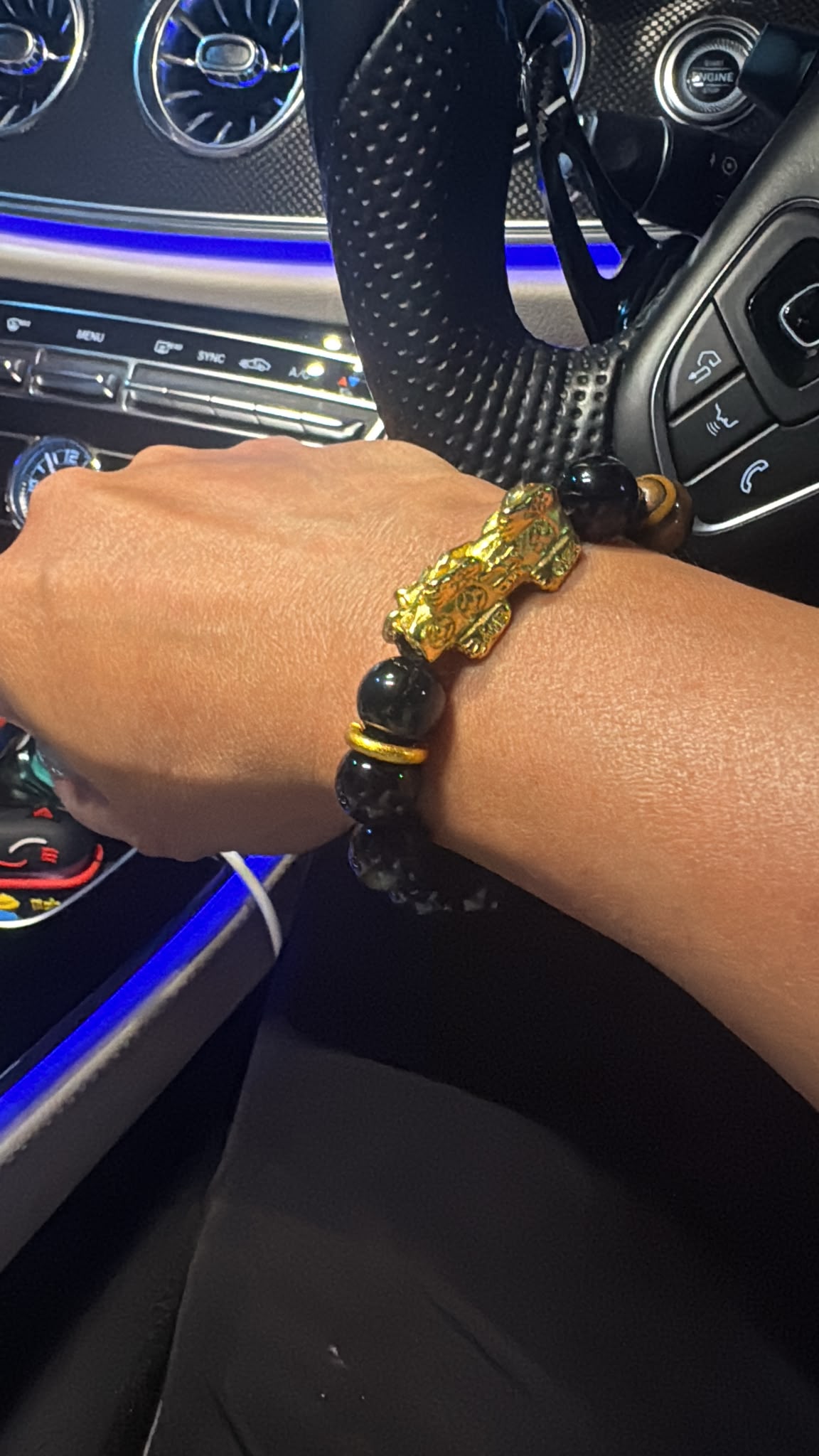 KK wearing The Closer bracelet