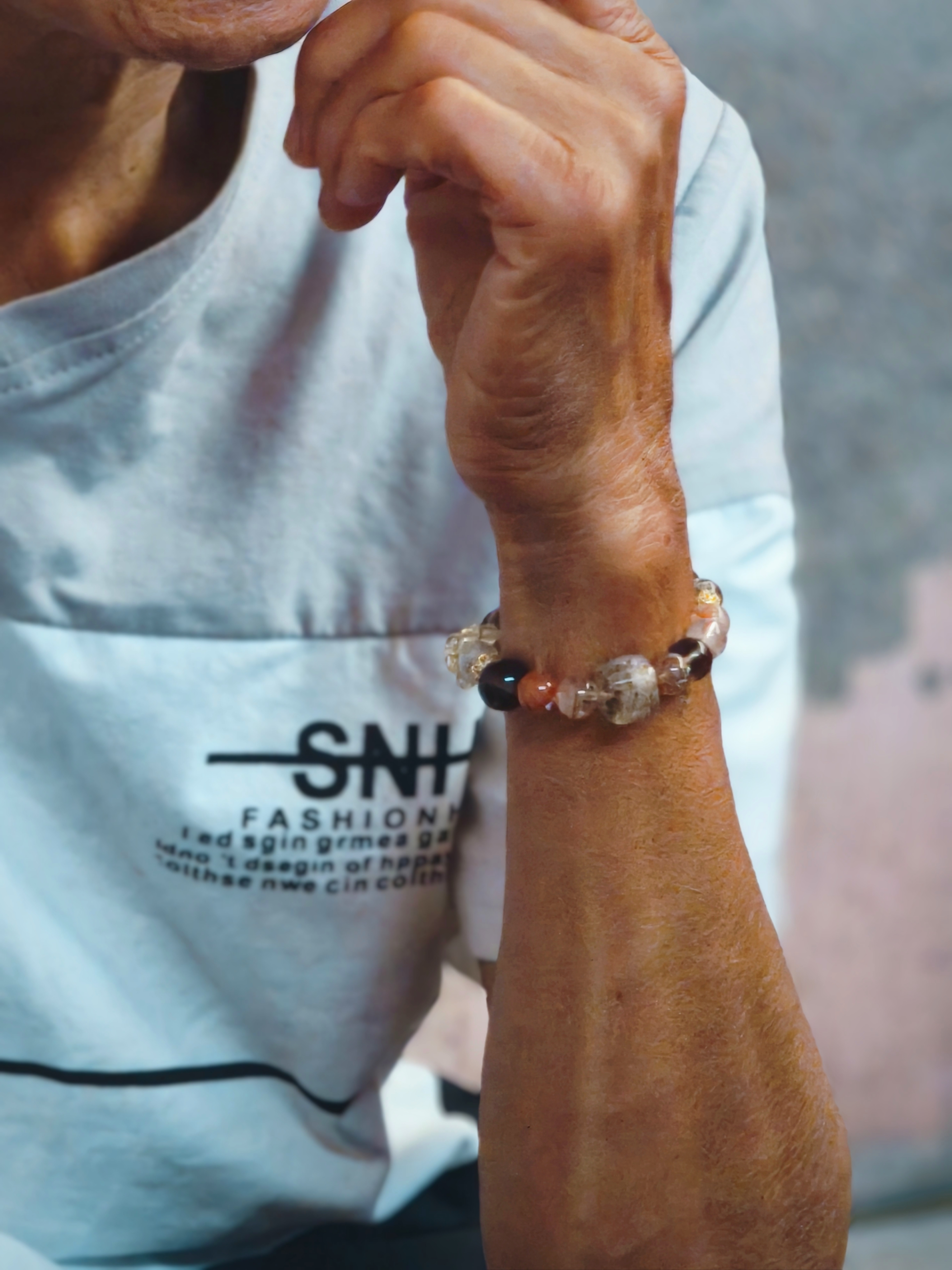 Ms. Chen wearing The Connector bracelet