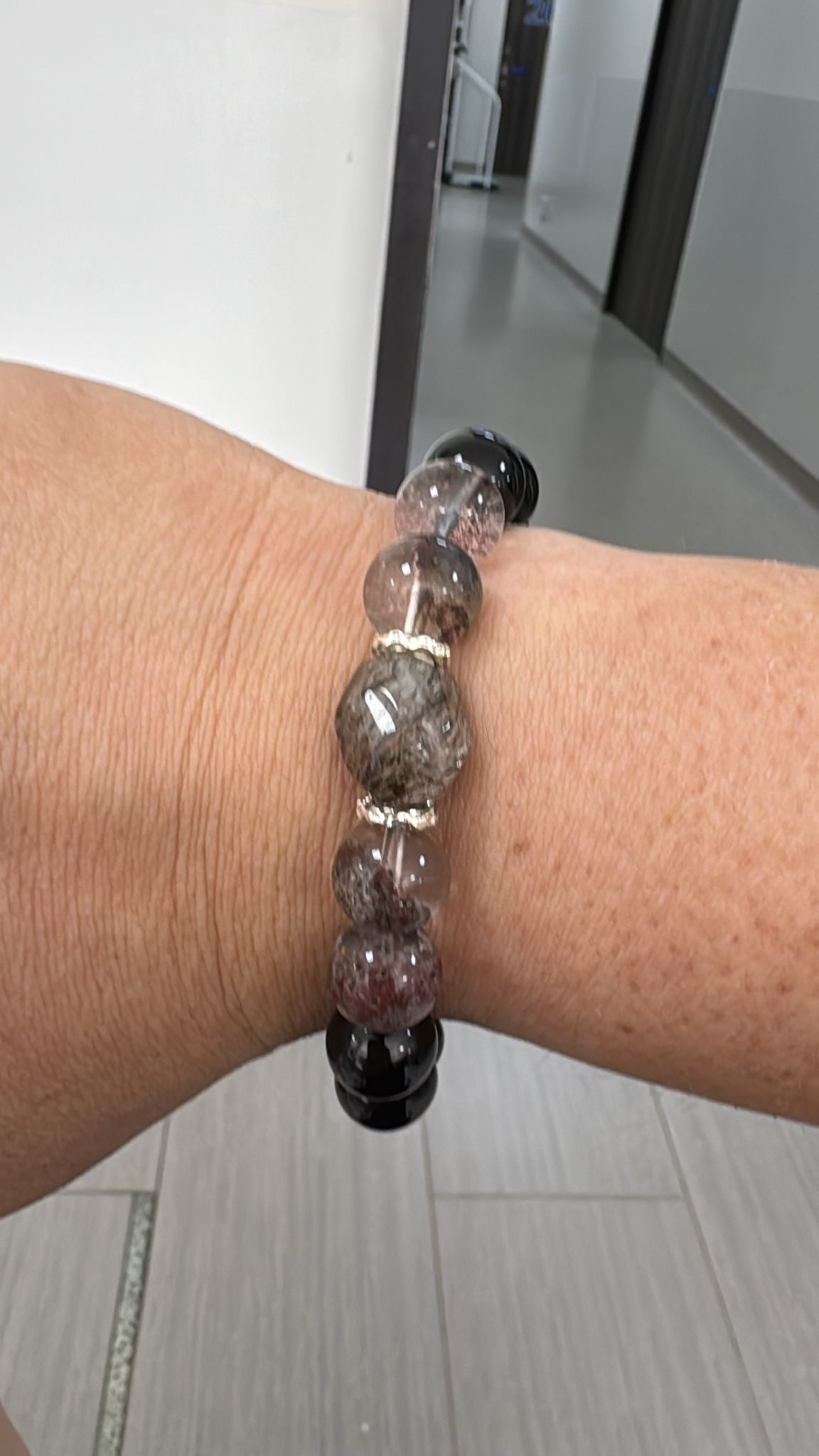 SJ Tan wearing The Trailblazer bracelet